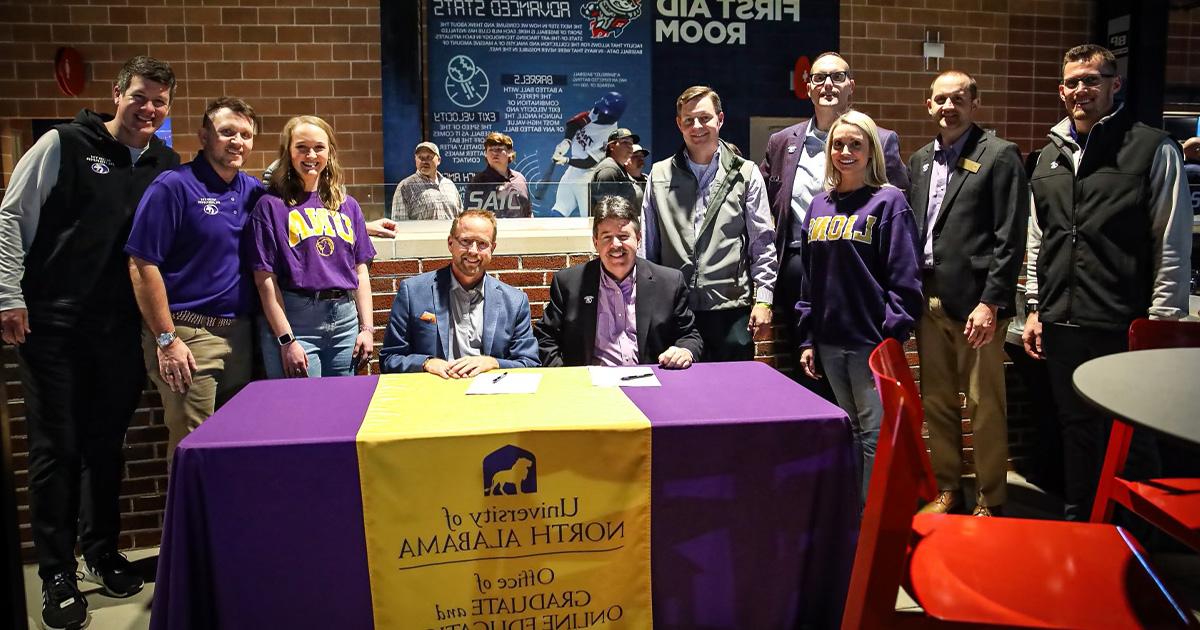 Representatives from the University of North Alabama and MartinFed signed a learning agreement that benefits MartinFed employees. The signing took place at the Trash Pandas Stadium in Madison.